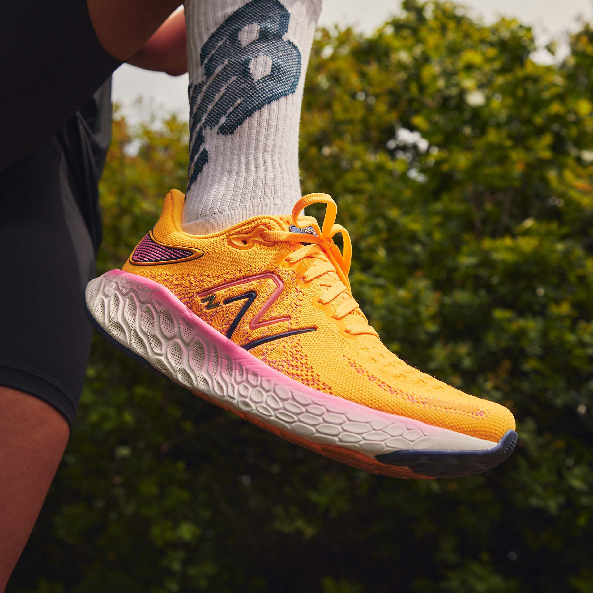 Slide profile of yellow 1080 shoes