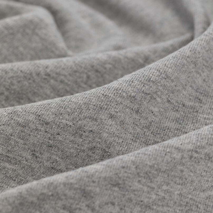 Close up of the texture and material of the long sleeve shirt.